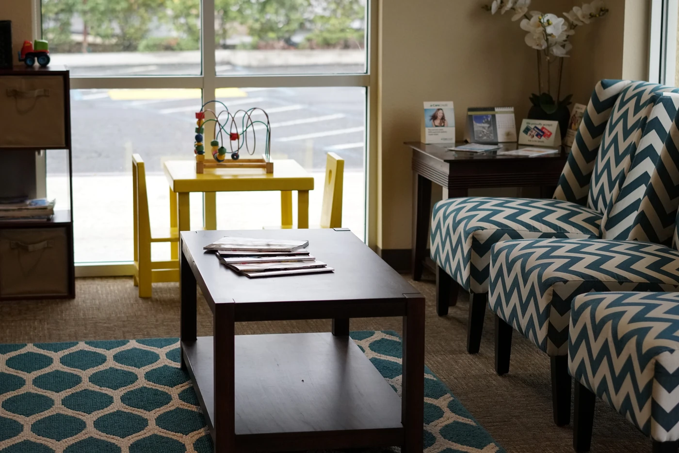 Family-friendly waiting area with kids' corner at Fulton Family Dental